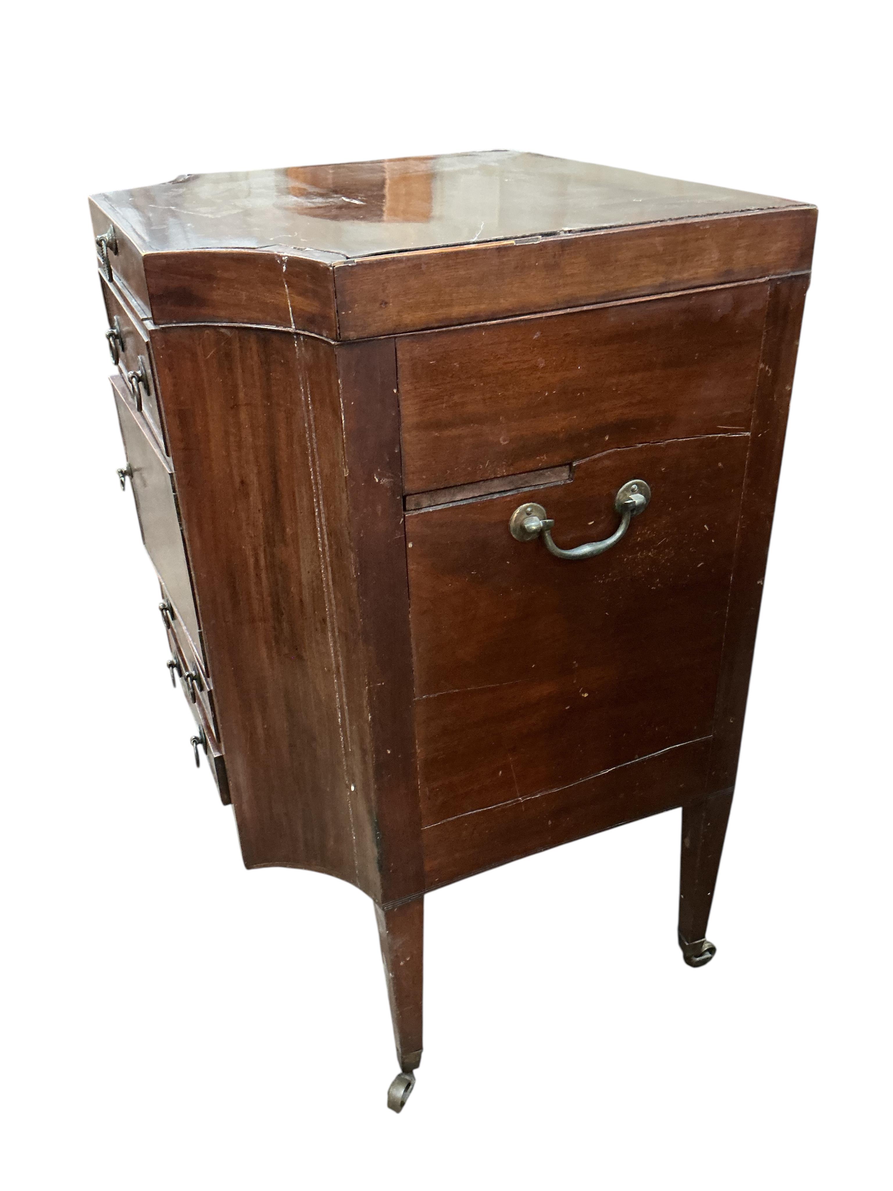A George III mahogany enclosed washstand, damaged, width 58cm, height 92cm